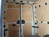 the inside of a van with the door open and the interior covered in plywood plywood plywood plywood plywood plywood plywood