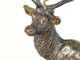bronze statue of a stag with antlers on a white background