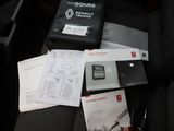 a lot of items that are sitting on the seat of a car