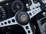 a close up of a steering wheel and dashboard of a car