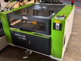 a large machine that is sitting in a garage