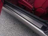 a close up of a red car with its door open