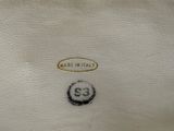 an image of a close up of a white bag with a number 32 on it