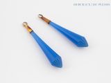 pair of blue glass drop earrings on a white background