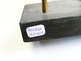 a small black object with a sticker on it