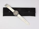 an image of a white watch with a black case on a white surface