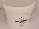 a white bucket of whey is sitting on a table
