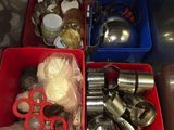 many containers with different types of kitchen utensils in them