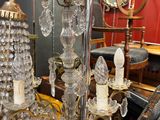 a lot of glass and metal items on the table