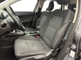 the interior of a car with the front seats folded down