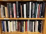 a book shelf with many books on it