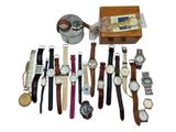 a lot of watches that are sitting on a table