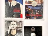 Trois affiches du président de la République française sont accrochées au mur.