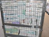 a large metal cart with a lot of bottles on it