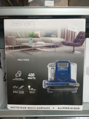a box of vacuum cleaner on the shelf in the store
