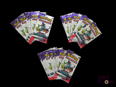 four packs of pokemon trading cards on a black background