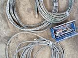 two wires that are laying on the ground