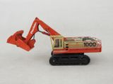 a toy excavator that is sitting on a white surface