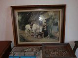 une photo d'une table sur laquelle se trouvent les photos d'un homme et d'une vache