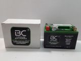 two batteries are sitting next to each other on a table