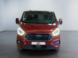 the front of a red ford transit van parked in a white room