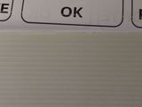 a close up of a sign on a refrigerator door