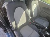 two seats in the back of a small car