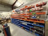 many shelves with various items in them in a store