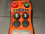 a close up of a remote control on a table