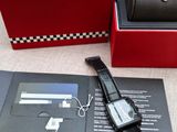 a watch that is sitting in a box on the floor