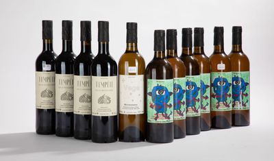 six bottles of wine are lined up in a row on a white surface