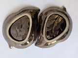a pair of goggles that are sitting on a table
