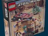 une boîte contenant des sets Lego Star Wars sur fond bleu