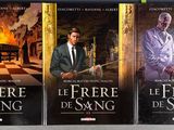 three books on a shelf in a library with a man in a suit and tie