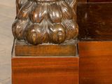 a statue of a man with a beard on a pedestal