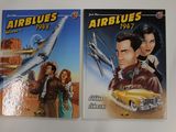 two books on a white surface with a picture of a man and a woman in front of an airplane