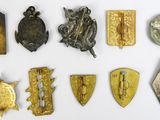 a lot of metal items that are on a white surface