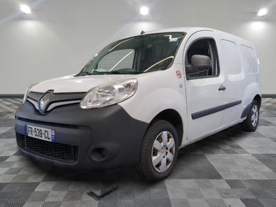 a picture of a white van parked on a checkered floor