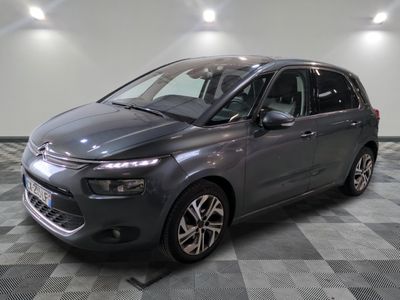 the grey citrole is parked on a checkered floor
