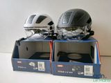 two helmets that are sitting on top of each other