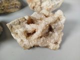 a close up of a rock with some rocks in the background