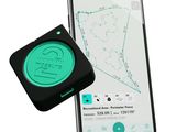 an image of a cell phone with a gps device next to it