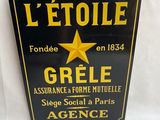 Enseigne métallique française vintage « L'Étoile Greee Assurance & Forme Muelle »