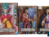 three different types of action figures displayed in a row