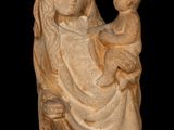 statue of a woman holding a child in her arms