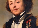 portrait of a man in a black coat and white shirt