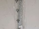 a close up of a toothbrush wrapped in plastic on a table