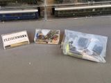 three train sets sitting next to each other on a table