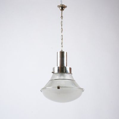 an image of a light hanging from a ceiling with a chain
