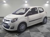 a picture of a small white car parked in a garage